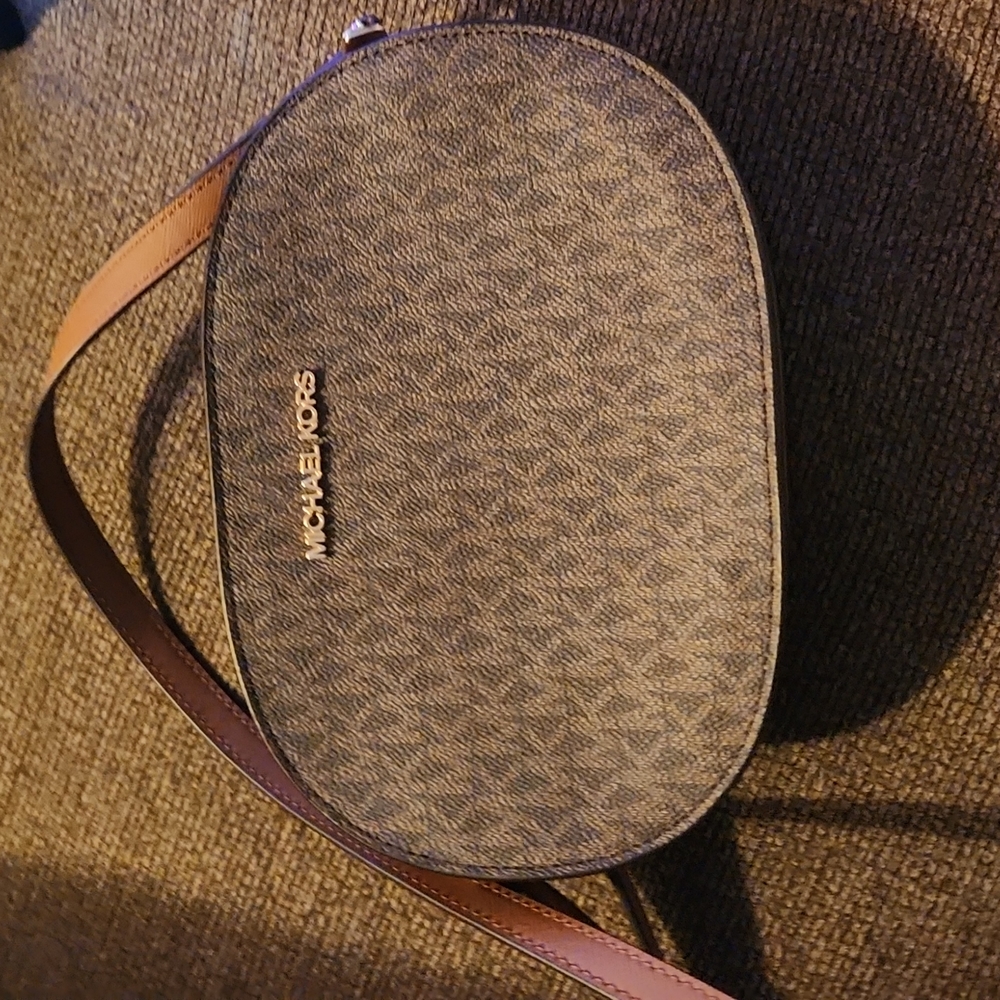 Authentic Michael kors  camera cross body bag .
